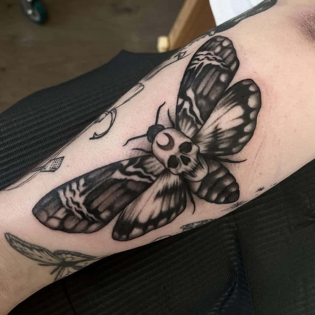 death moth tattoo blackwork