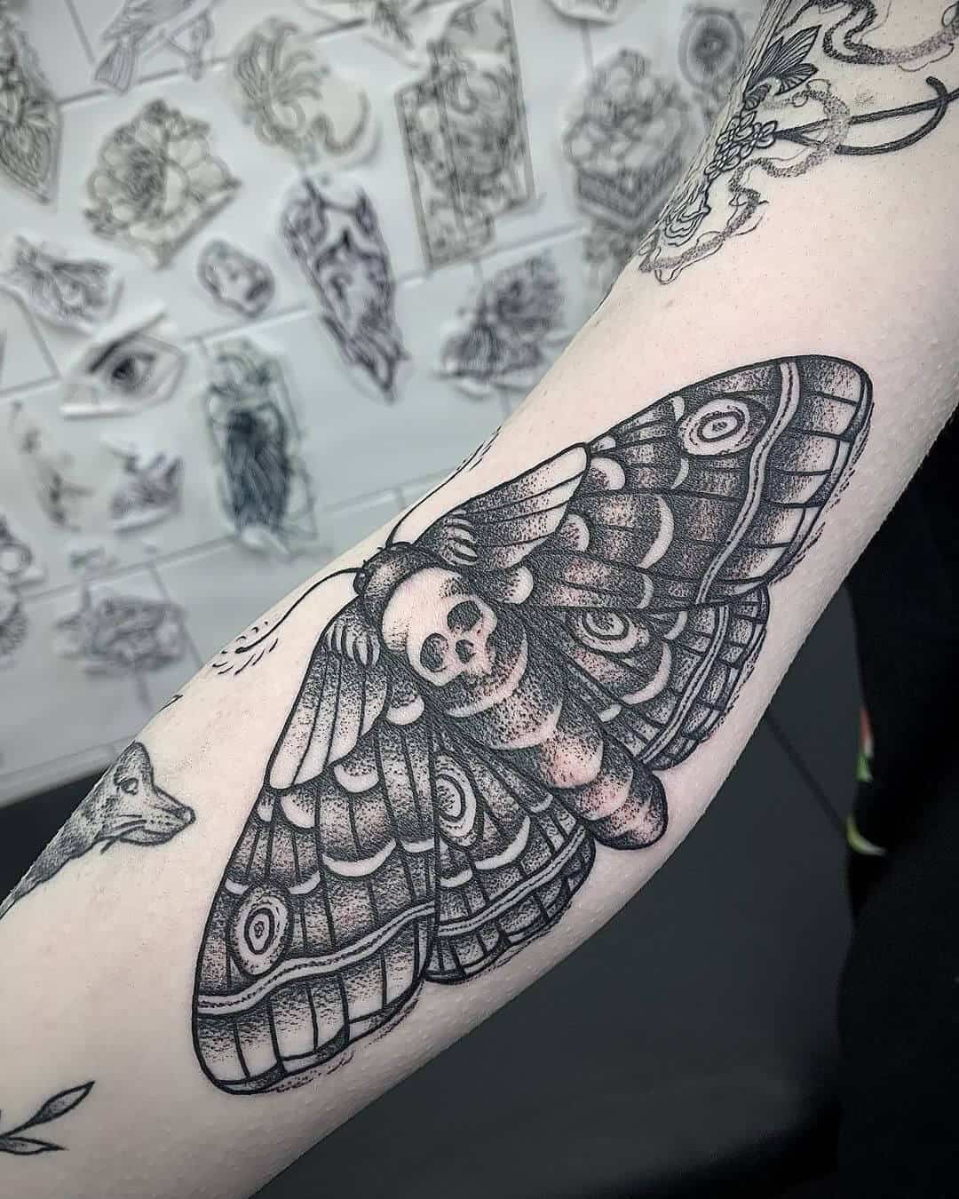 death moth tattoo blackwork