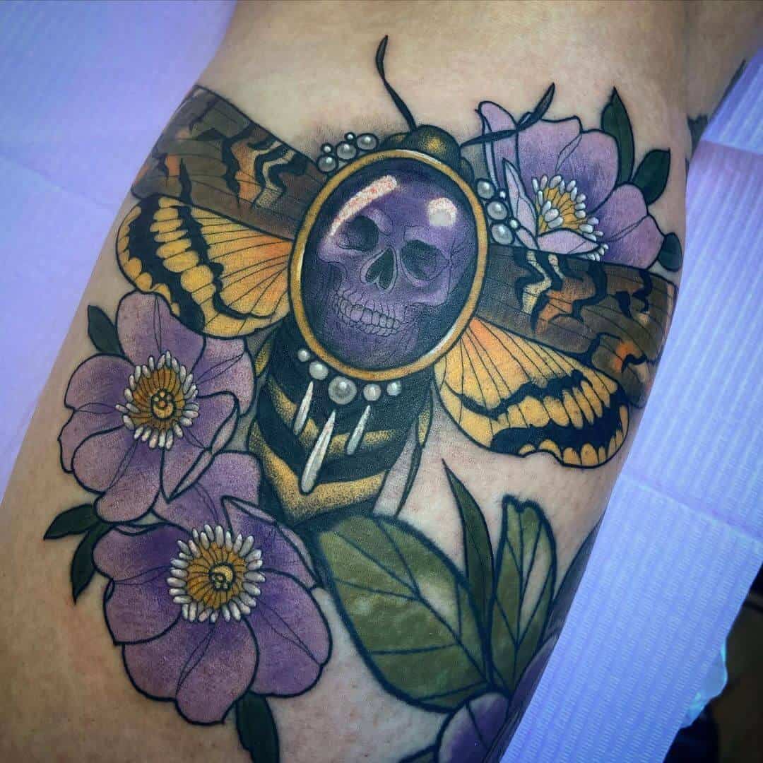 colored death moth tattoo