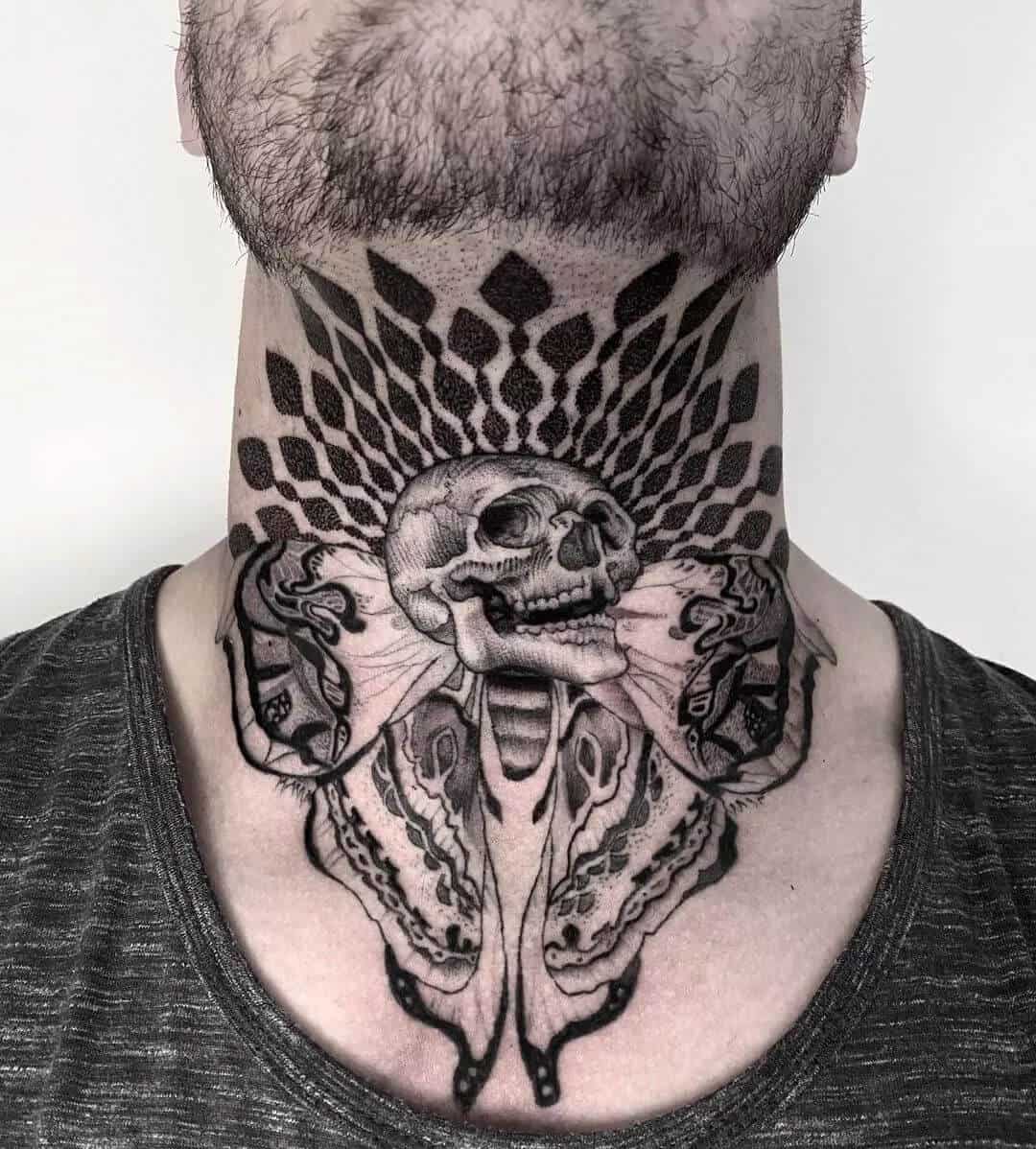 death moth tattoo on neck