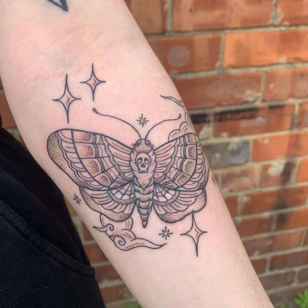 death moth tattoo on arm