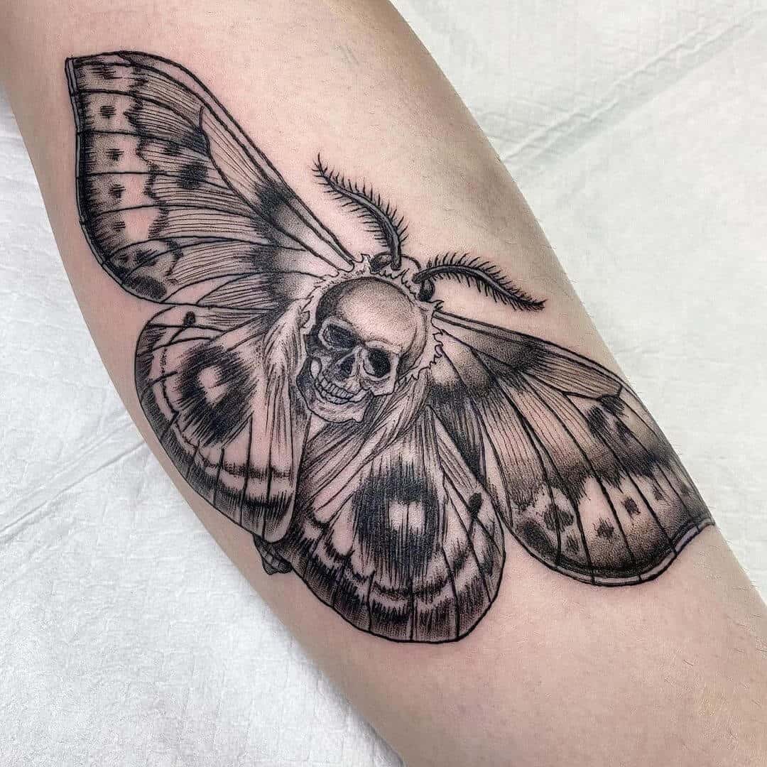 death moth tattoo on arm