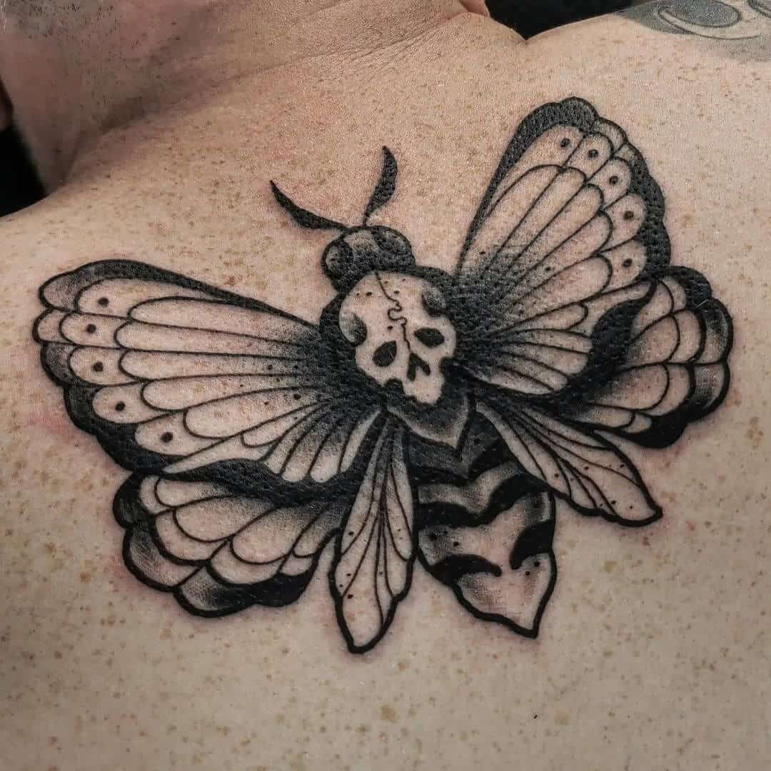 death moth tattoo on back