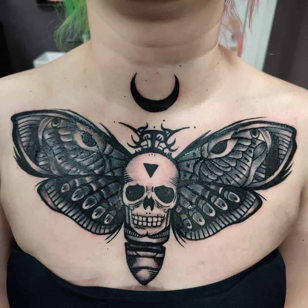 death moth tattoo on chest