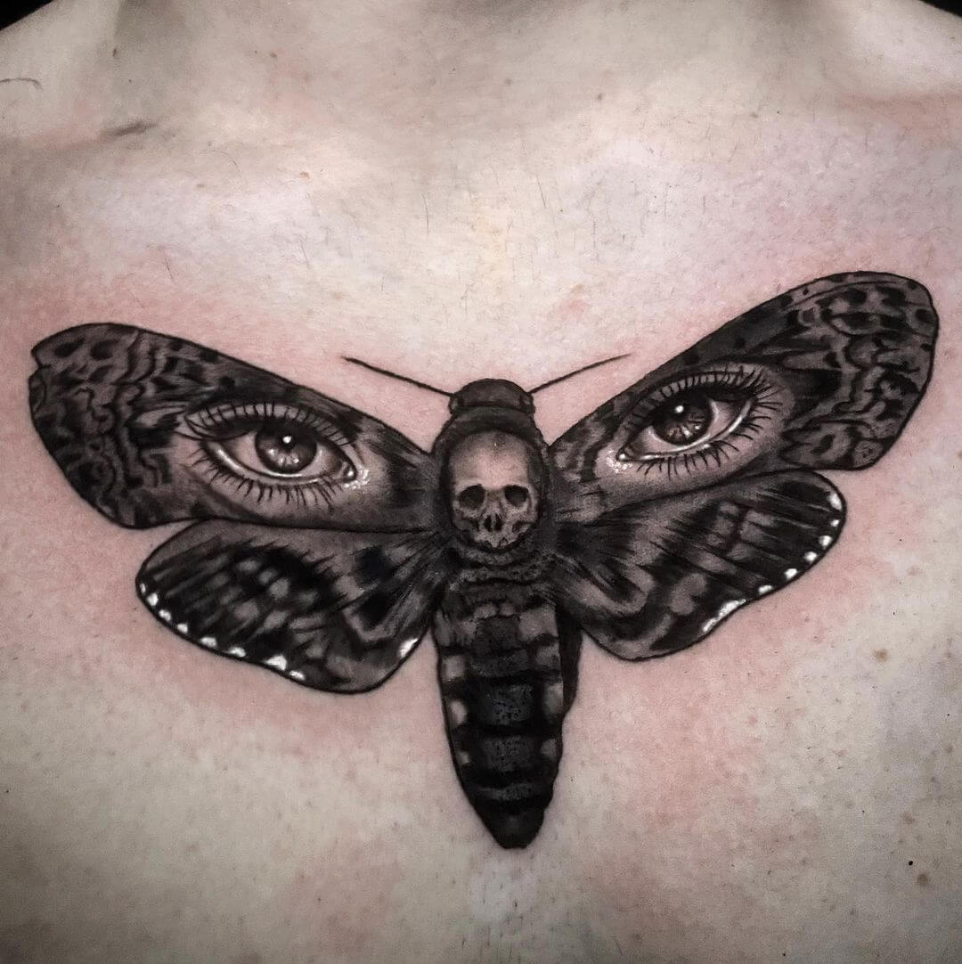 death moth tattoo on chest