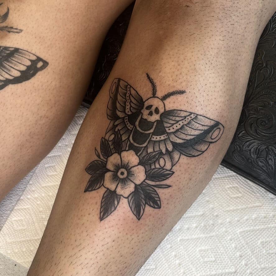 death moth tattoo on leg