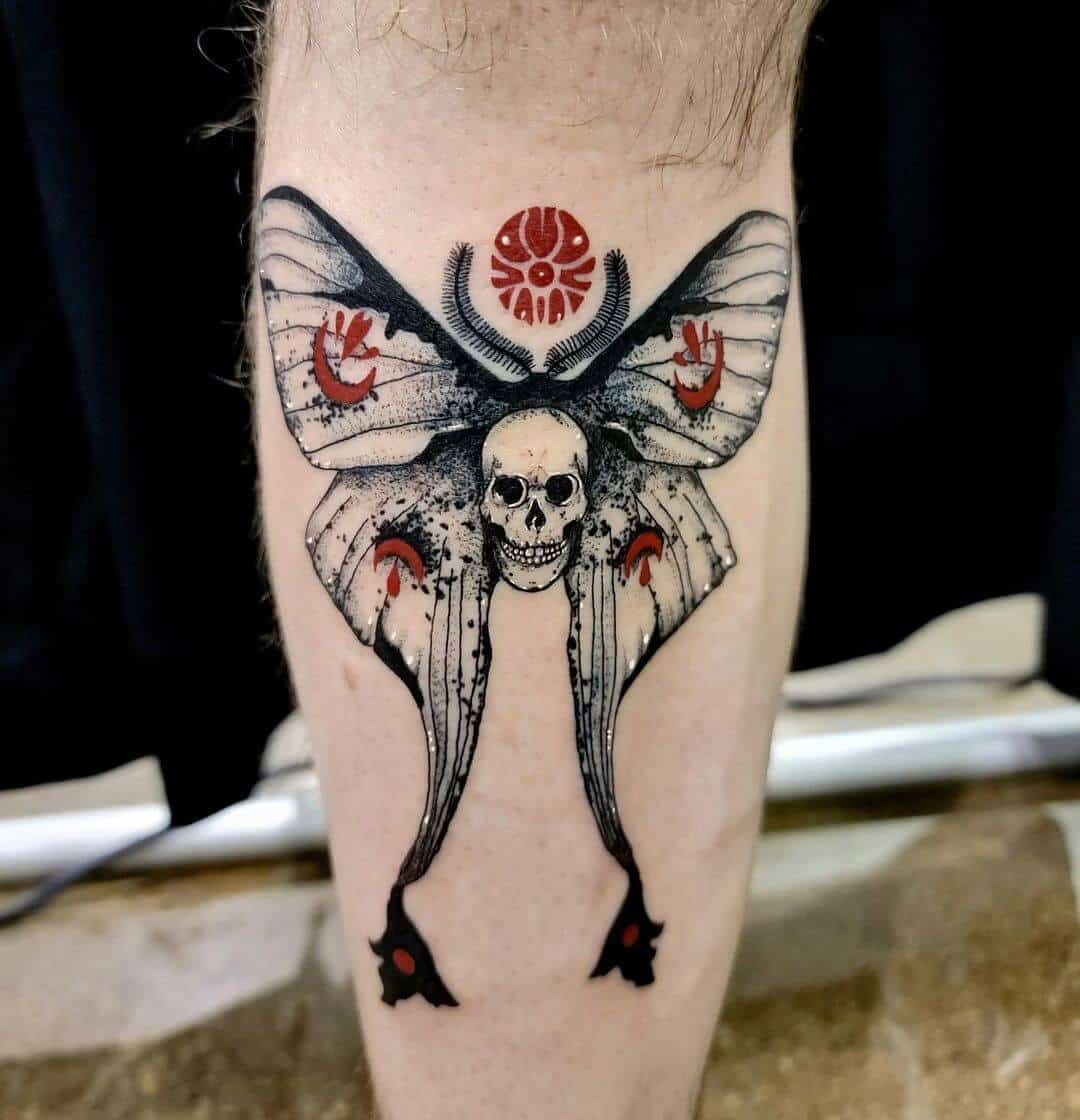 death moth tattoo on leg