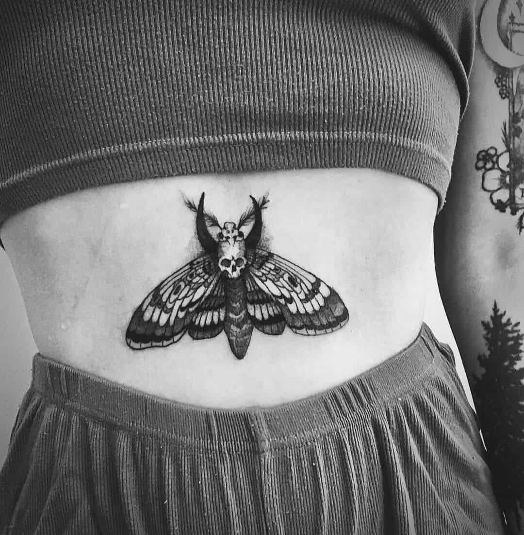 death moth tattoo on stomach