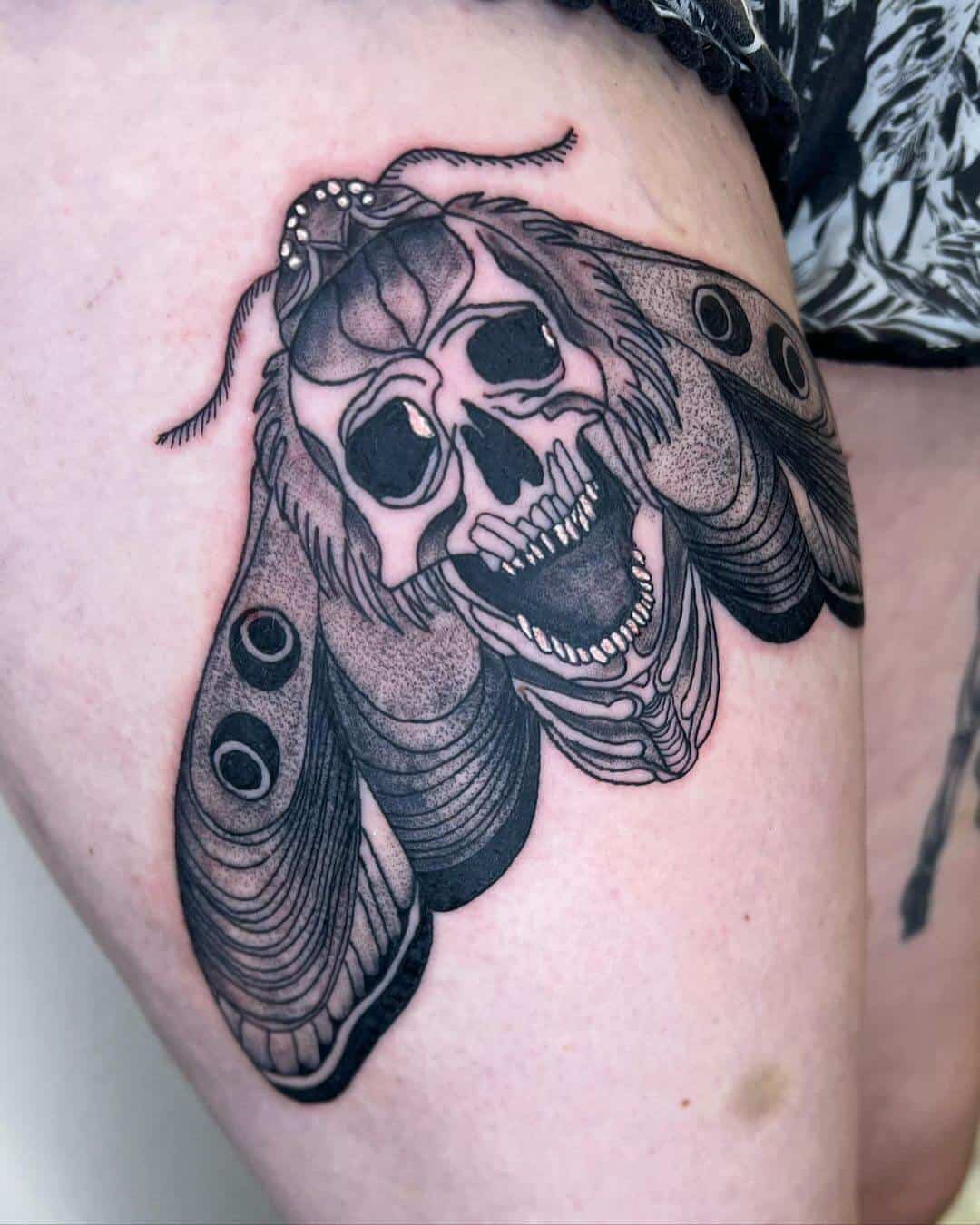 death moth tattoo skull