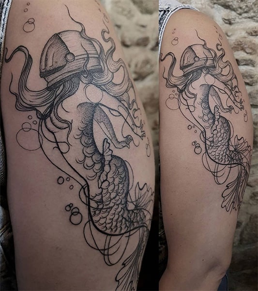 Blackwork mermaid tattoo