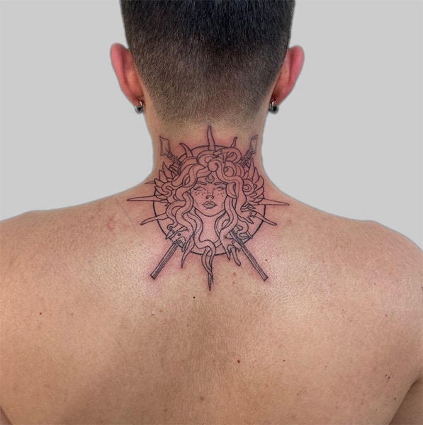 Medusa black ink back tattoo