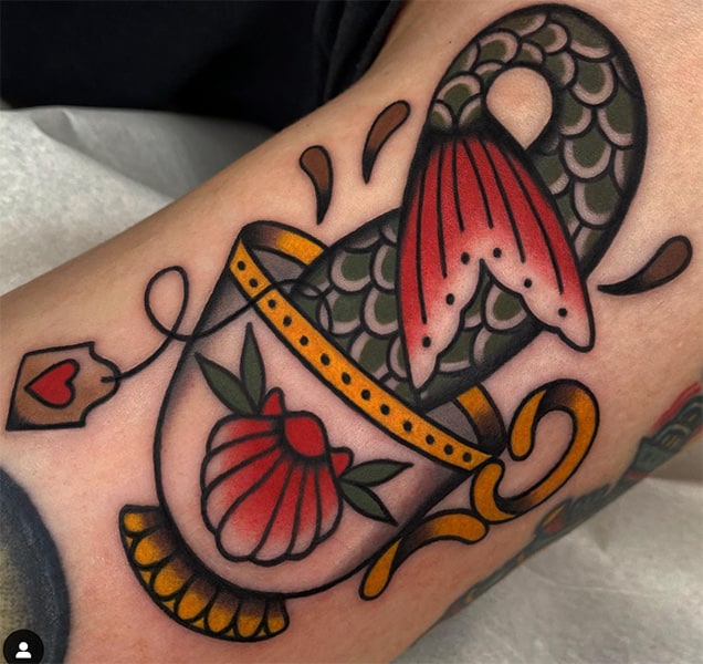 Mermaid tail tattoo