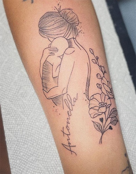 Mother and baby arm tattoo