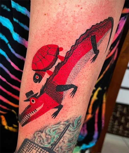 Red turtle and croc tattoo