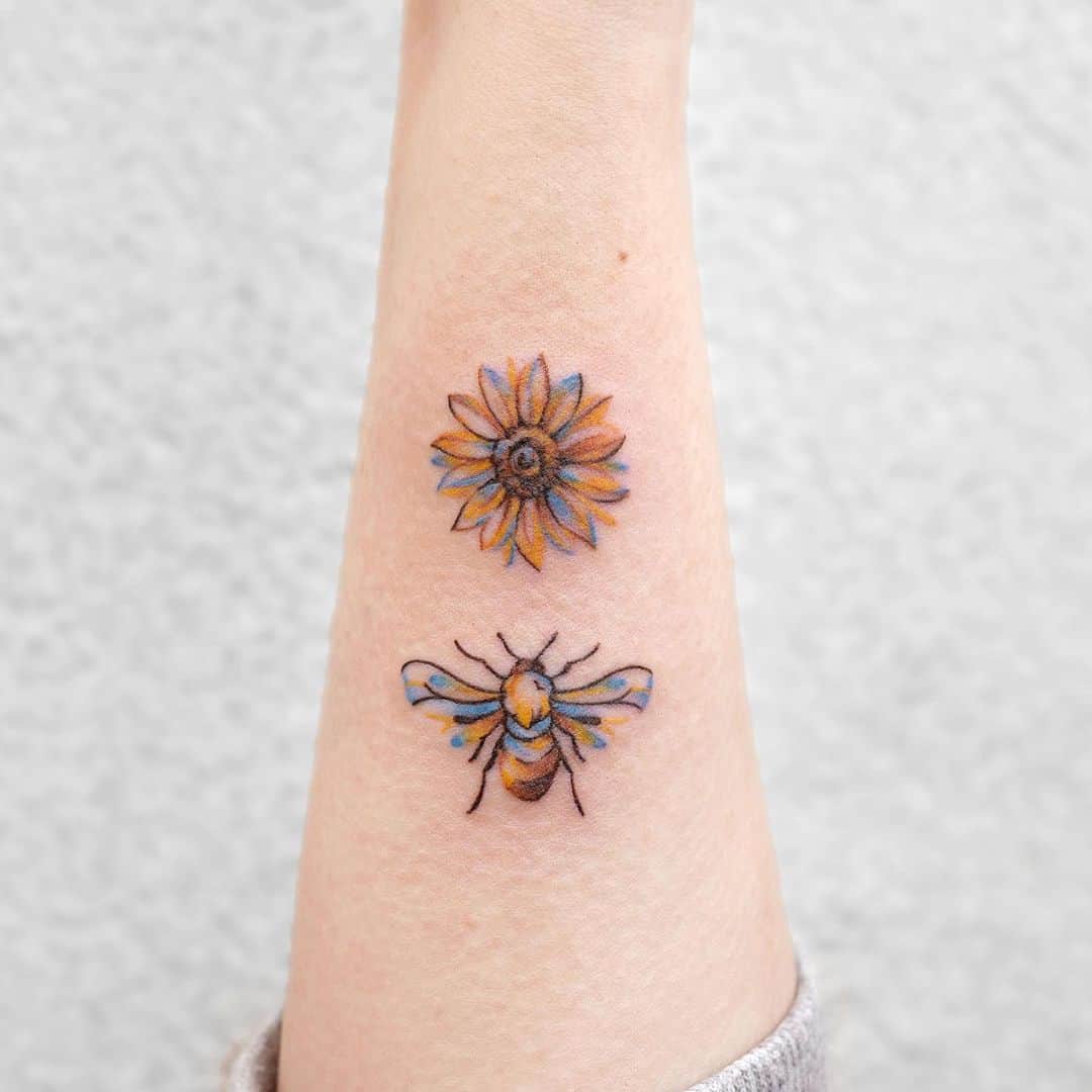 bee and flower tattoo