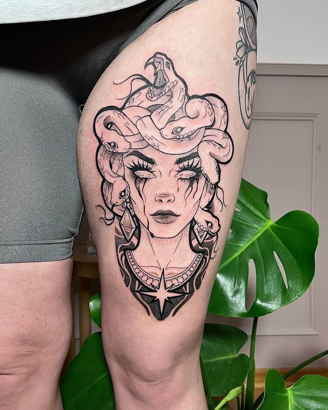 medusa thigh tattoo