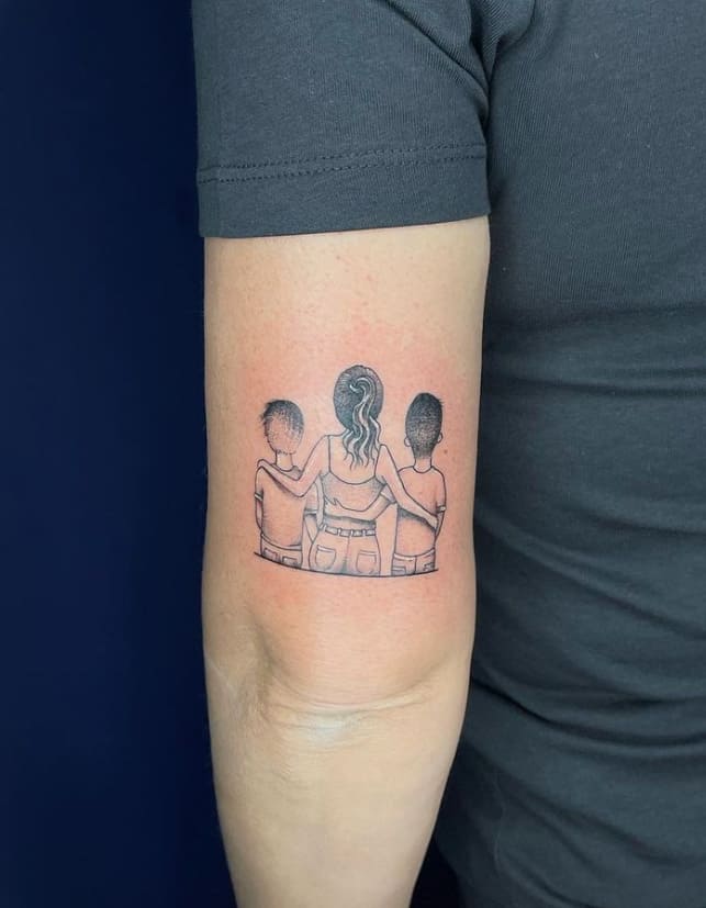 small arm tattoo of mom and sons