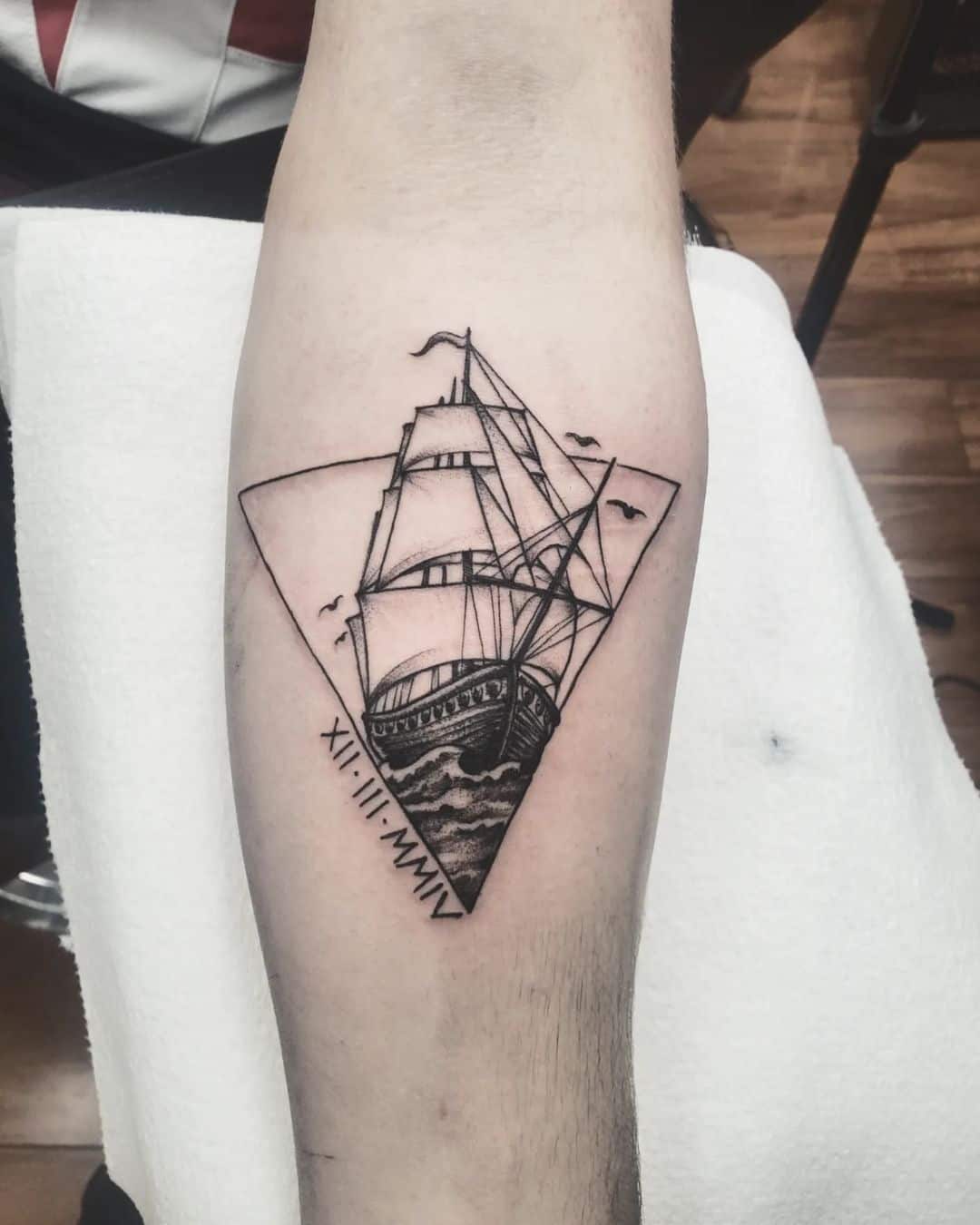 small ship tattoo