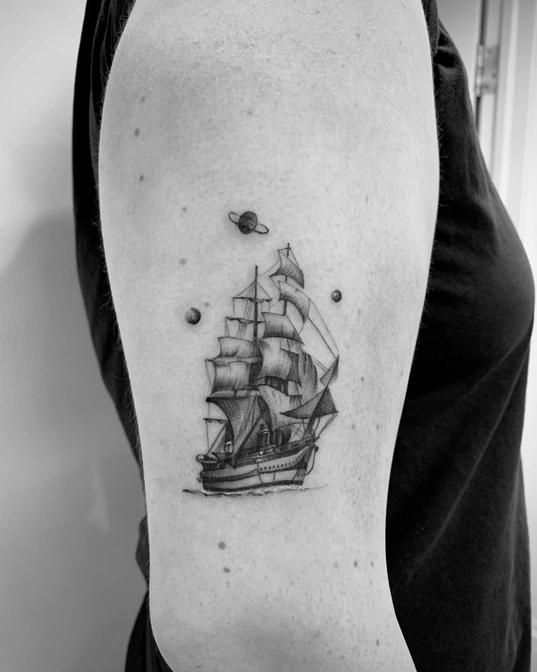 sailboat tattoo on shoulder